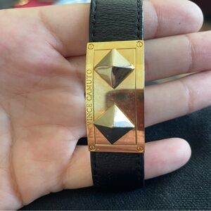 Cool leather bracelet with dual brass spikes and a lock on the back